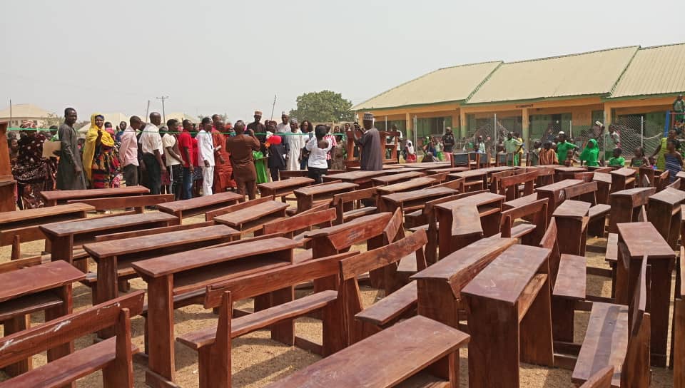Pupils of LEA Jeida displaying cultural dance at the donation of dual desks to the school