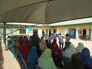 WFI Staff delivering Health Talk during Cancer screening for Women