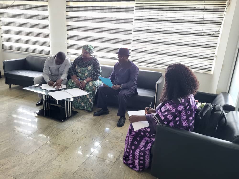 KAC Chief of staff signing the MOU for the waterless and odourless toilet