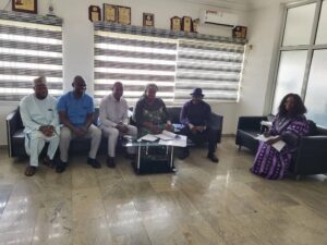 Program Manager of WFI, Rosemary Adejoh signing as a witness