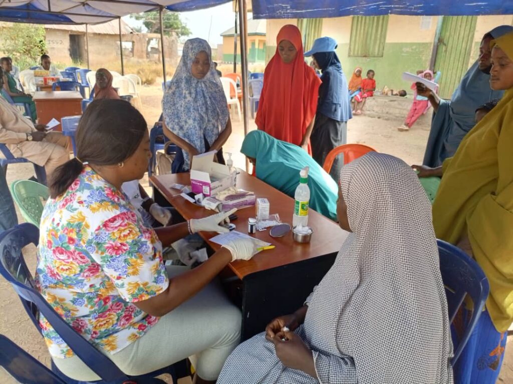 WFI-JICA Team conducting health check in Takushara Community